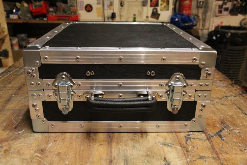 Frontal view on (closed) modular suitcase